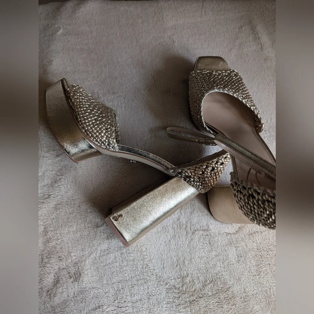 Sam Edelman Nattie platform sandals in metallic gold woven leather.